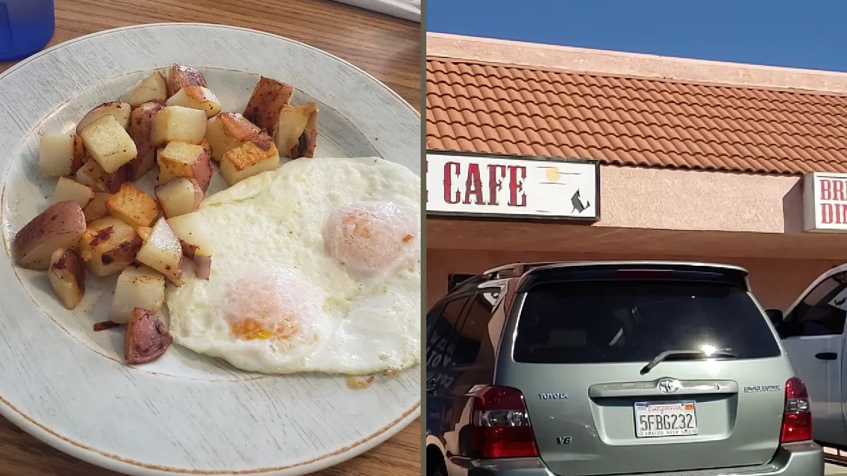 Coffee cups beside a simple meal.